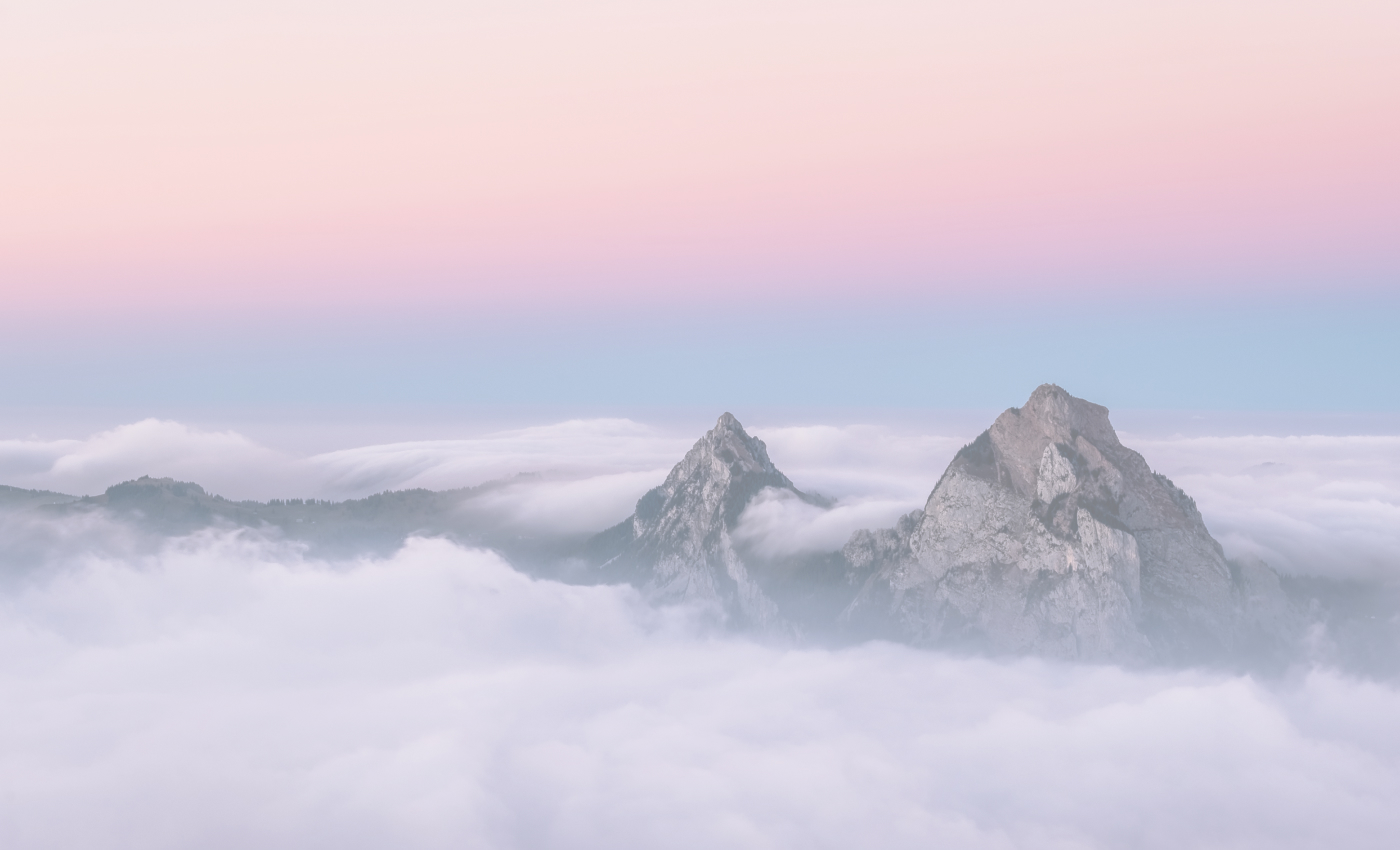 mountains covered by clouds
